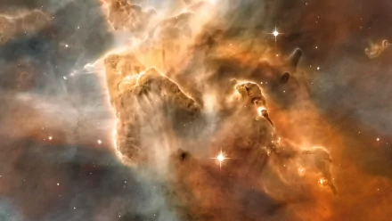 HD PC desktop wallpaper featuring a vivid sci-fi space scene with glowing stars and a dense, colorful nebula swirling through cosmic clouds.