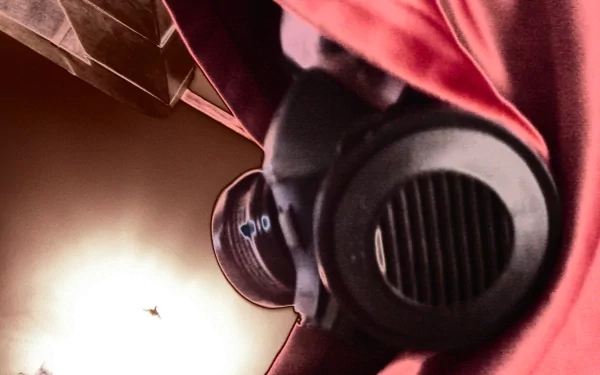 HD PC desktop wallpaper showing a close-up of a person in military gear wearing a gas mask, illuminated by a soft light in a dark setting.