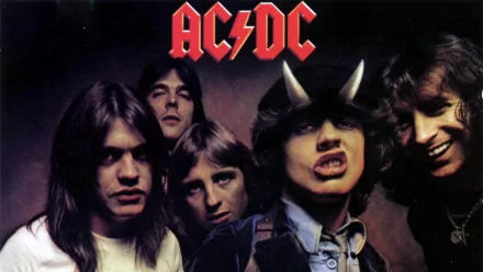 HD desktop wallpaper featuring AC/DC band members posing with the iconic band logo above them.