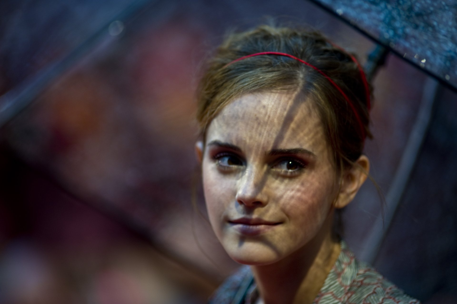 Close-up portrait of Emma Watson with soft lighting, rendered in 4K Ultra HD quality for a striking PC desktop wallpaper and background.