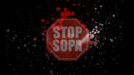 A striking HD desktop wallpaper featuring a red STOP SOPA sign against a splattered dark background, symbolizing resistance against internet censorship and promoting online freedom.