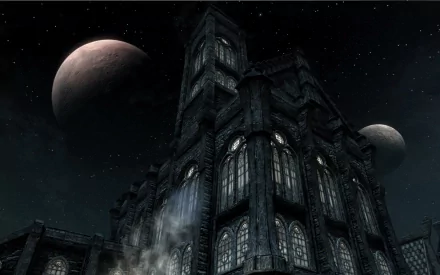 HD PC desktop wallpaper from The Elder Scrolls V: Skyrim showing a dark, towering castle under a starry sky with two moons in the background.