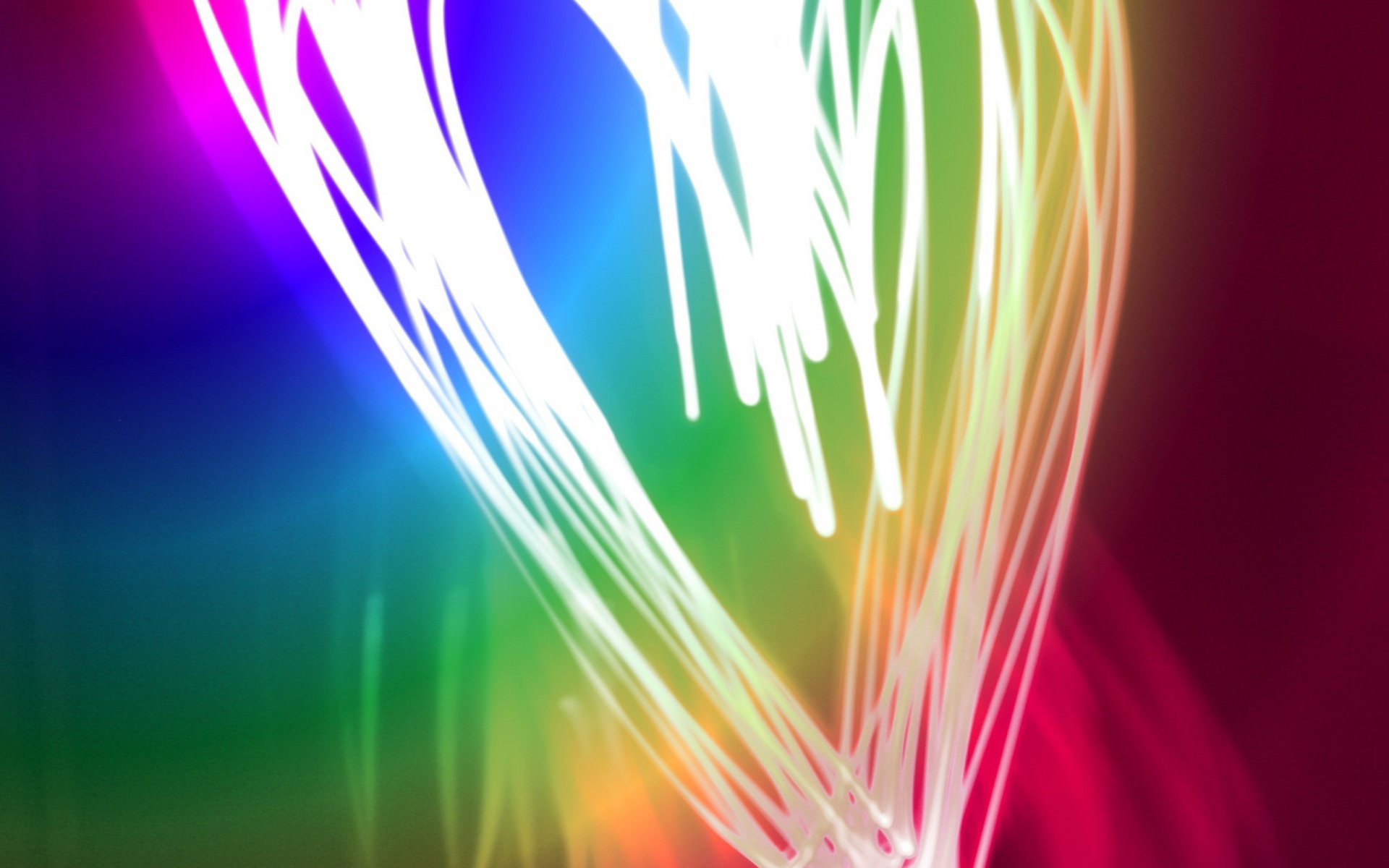 A vibrant, artistic depiction of a heart made with swirling white light against a colorful background, capturing the essence of love in an HD desktop wallpaper.