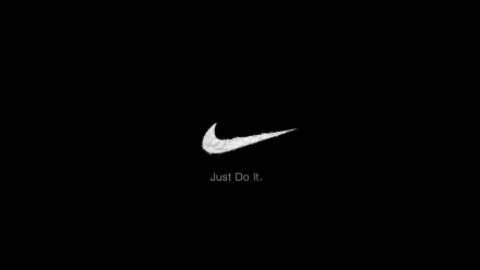 HD desktop wallpaper featuring the iconic Nike swoosh logo and the slogan Just Do It. Set against a sleek black background, it embodies a bold, sporty aesthetic.