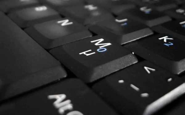Close-up view of a black keyboard, showcasing the keys in sharp detail. This HD PC desktop wallpaper highlights the technology theme beautifully.
