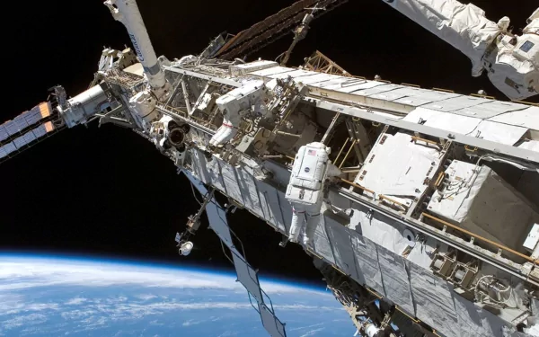 A stunning HD view of the International Space Station against the backdrop of Earth, showcasing NASA's remarkable man-made achievement in space exploration.