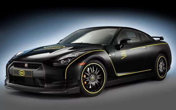 HD PC desktop wallpaper featuring a black Nissan sports vehicle with yellow pinstriping and matching wheel accents, shown in dramatic studio lighting on a soft gradient background.