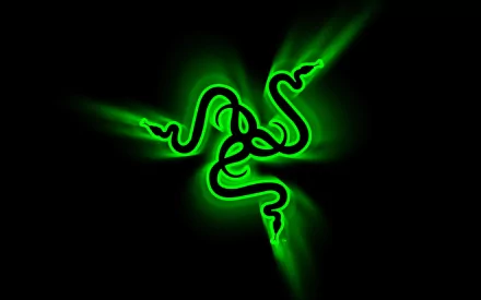 An abstract HD desktop wallpaper featuring the iconic green Razer logo, set against a sleek black background, radiating dynamic green light effects.
