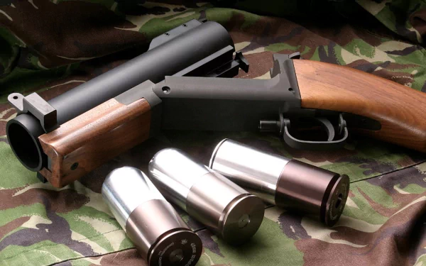 A high-definition wallpaper featuring a man-made pistol with wooden accents, accompanied by metallic cartridges, set against a camouflaged background.