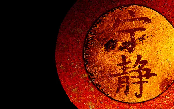 Firefly (TV show) 2K Quad HD desktop wallpaper: weathered red-orange circular Chinese seal reading the show's Serenity characters on a black textured background.