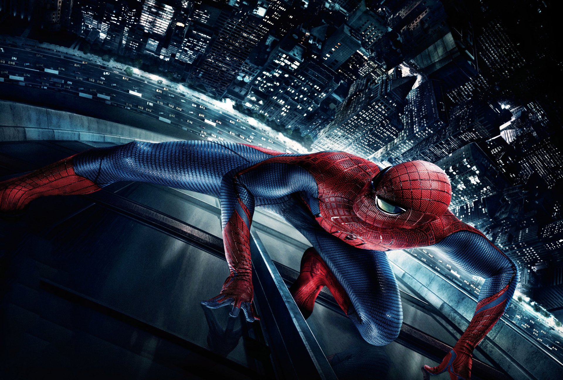 A striking HD wallpaper of Spider-Man from The Amazing Spider-Man, poised heroically against a city skyline, showcasing his iconic red and blue suit in action.
