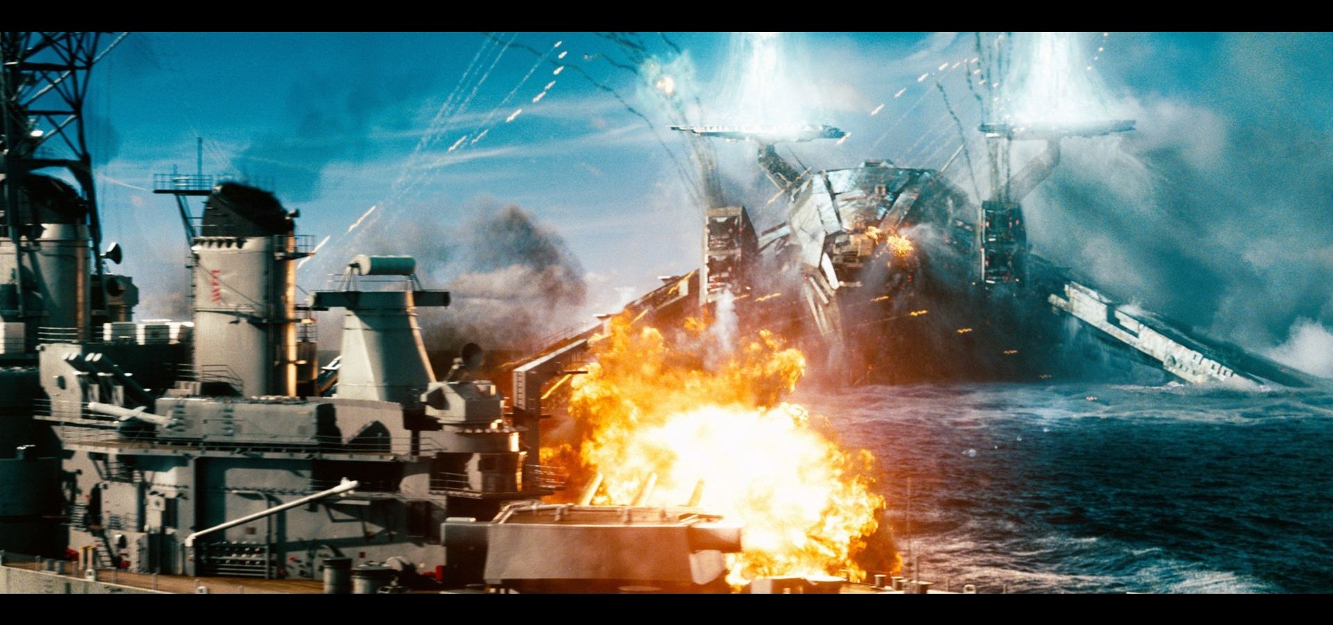HD PC desktop wallpaper and background: movie battleship scene — warships exchanging fire, a massive explosion and billowing smoke across the ocean.