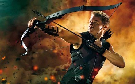 Hawkeye, portrayed by Jeremy Renner, draws his bow in this dynamic HD desktop wallpaper, capturing the intensity of the Avengers movie universe.