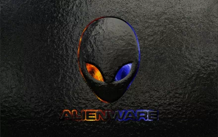 A sleek HD desktop wallpaper featuring the Alienware logo, showcasing its distinctive alien head with vibrant orange and blue eyes against a textured dark background.