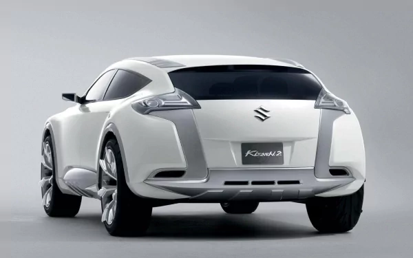 Rear three-quarter view of a white Suzuki concept vehicle on a clean gray backdrop — HD PC desktop wallpaper and background.