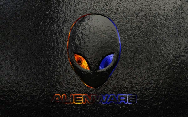 A sleek HD desktop wallpaper featuring the Alienware logo, showcasing its distinctive alien head with vibrant orange and blue eyes against a textured dark background.