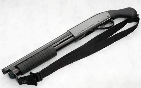 A high-definition desktop wallpaper featuring a man-made shotgun, showcasing its sleek design and functionality against a subtle background.