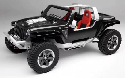 HD wallpaper of a black Jeep with rugged tires and red interior against a plain gray background.