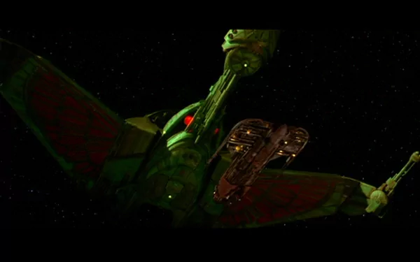 A dramatic scene from Star Trek III: The Search for Spock, featuring a sleek, fictional starship illuminated in vibrant colors against the backdrop of a starry space.