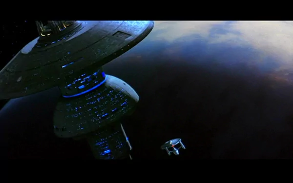 A stunning HD wallpaper from Star Trek III: The Search for Spock, showcasing a spacecraft near a futuristic space station with a backdrop of the cosmos.