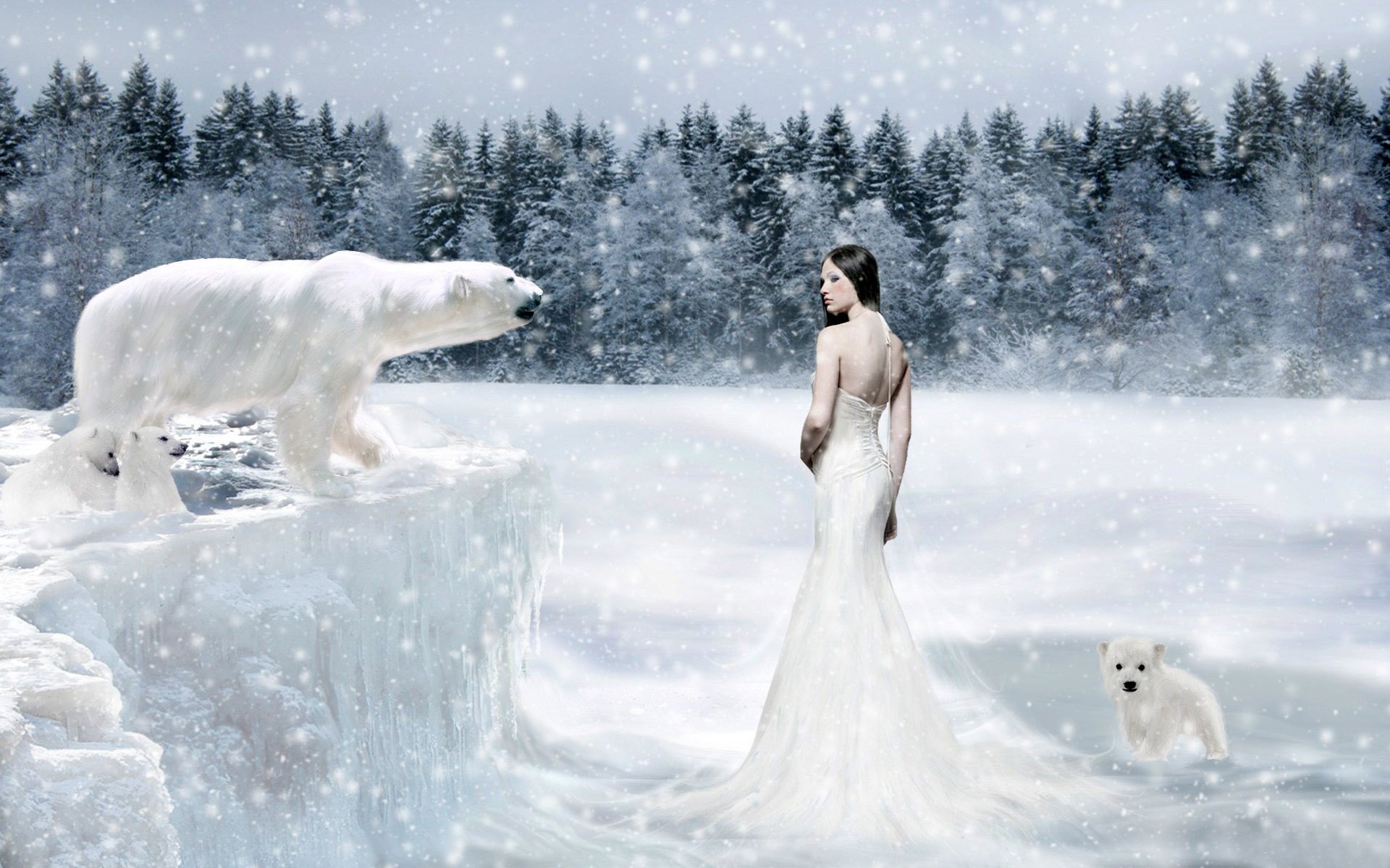 A woman in a flowing gown stands gracefully in a snowy landscape, gazing at a polar bear and a cub amid a fantasy backdrop of frosty trees and falling snow. HD desktop wallpaper.