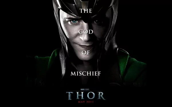A striking HD desktop wallpaper featuring Loki, the God of Mischief from Marvel Comics, highlighting his enigmatic expression with bold text from the movie Thor.