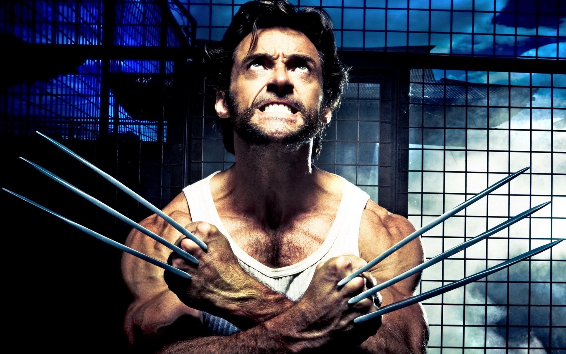 Hugh Jackman as Wolverine, showcasing his iconic claws in a dramatic pose from the X-Men movie series, set against a moody backdrop. Perfect HD wallpaper for fans.