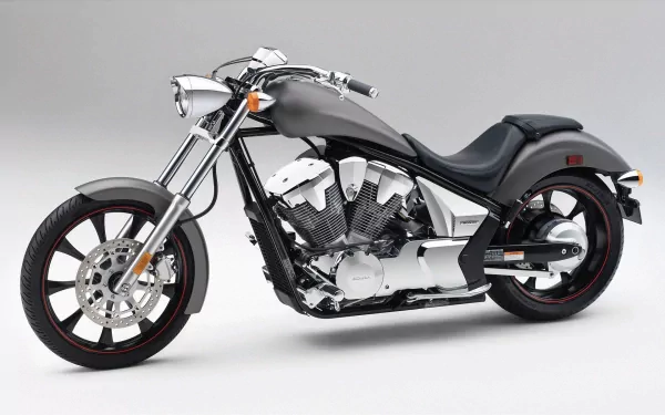 HD desktop wallpaper featuring a sleek Honda Fury motorcycle with chrome details and black accents against a light gray background.