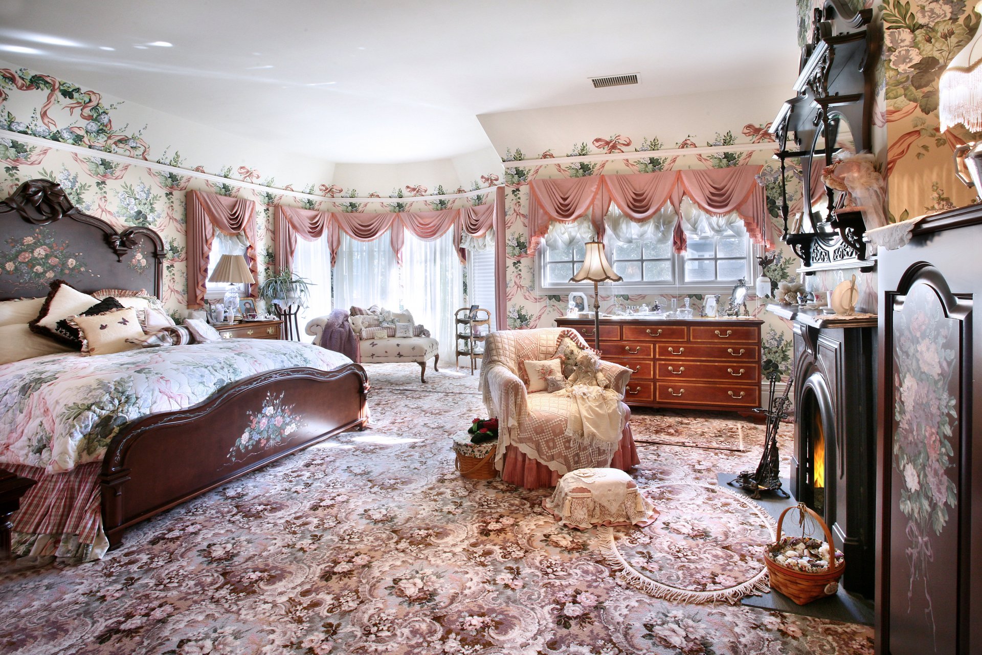 4K Ultra HD image of a vintage-style room featuring floral wallpaper, ornate furniture, a fireplace, and elegant draped curtains, showcasing man-made interior design.