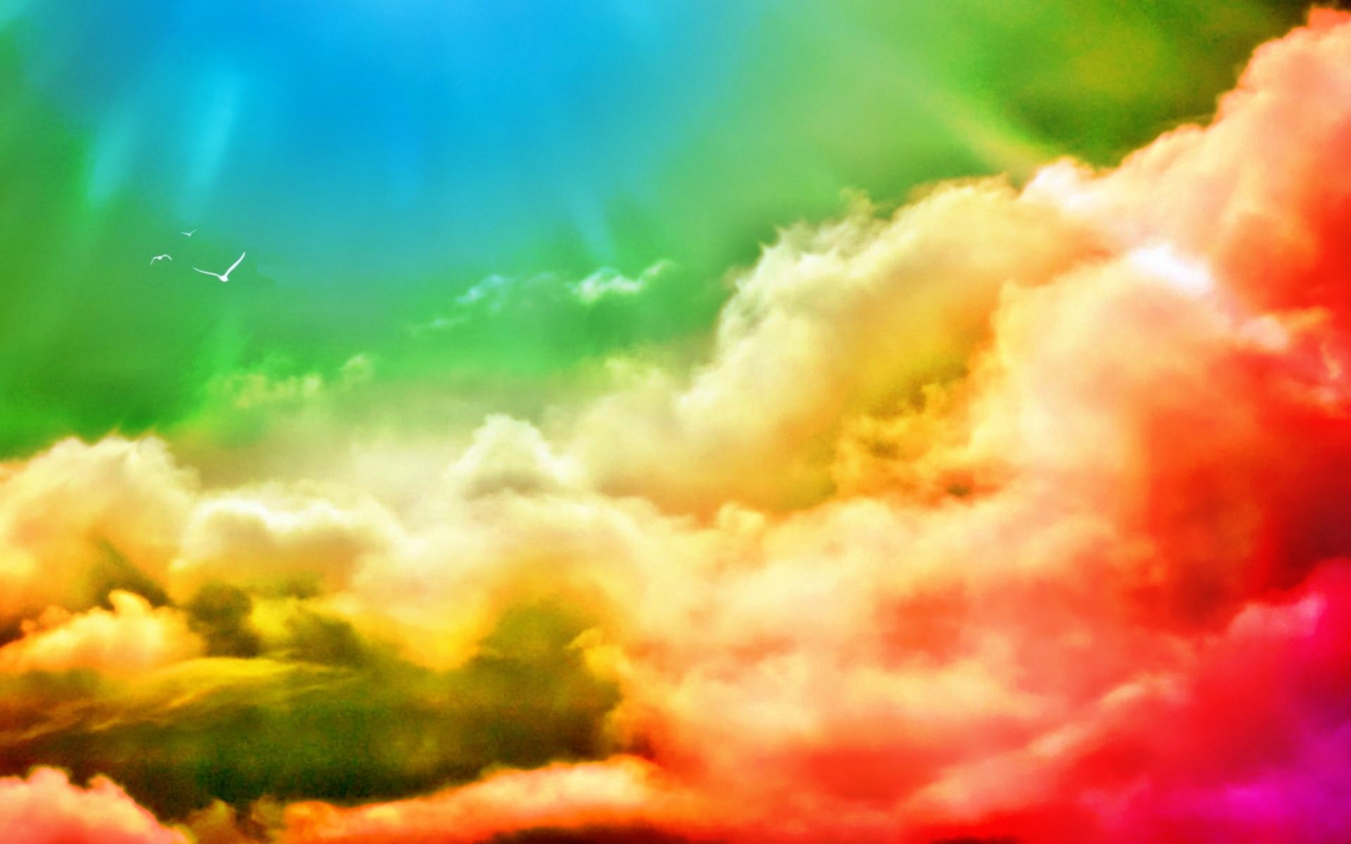 Vibrant abstract colors blend seamlessly in this HD PC desktop wallpaper, featuring a dynamic sky with soft, colorful clouds and a bright, glowing sun.