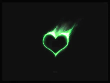 HD desktop wallpaper featuring an artistic green heart with a glowing, flame-like effect against a black background.