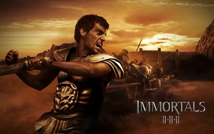 HD PC desktop wallpaper of the movie Immortals — armored Greek warrior swinging a spear in a sunset battle with chariots, soldiers, and the film title.