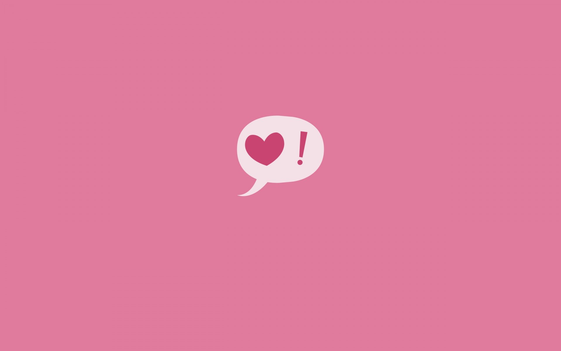 A minimalistic HD desktop wallpaper featuring a pink background with a playful speech bubble icon displaying a heart and exclamation mark, embracing themes of love and artistic expression.