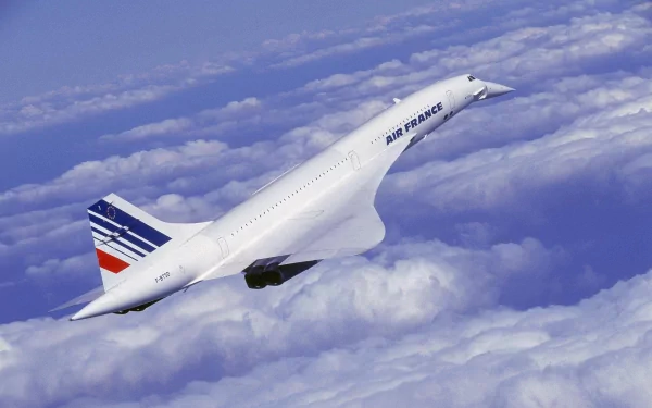 HD desktop wallpaper showing an Air France Concorde aircraft flying above the clouds, symbolizing speed and elegance in aviation.