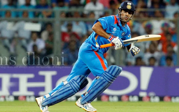 Mahendra Singh Dhoni, the renowned Indian cricketer, is captured in action as a batsman, showcasing his skills on the cricket field in this dynamic HD wallpaper.