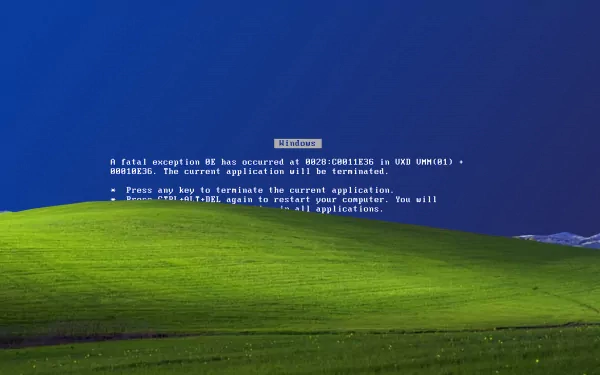 HD desktop wallpaper showcasing a classic Windows error screen over a serene landscape, highlighting technology and issues with a stark blue and green contrast.