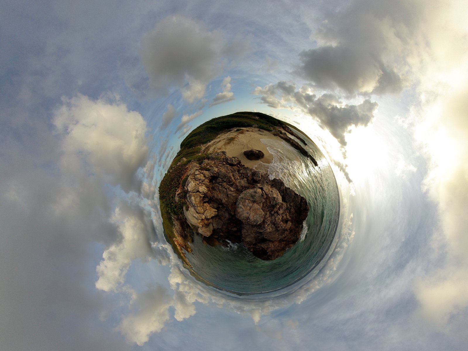 A captivating artistic representation of a planet showcasing a rocky island surrounded by serene waters and clouds, designed as an HD desktop wallpaper and background.