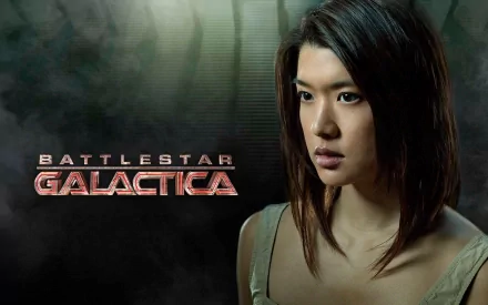 HD PC desktop wallpaper featuring a character from the TV show Battlestar Galactica (2003) against a dark, textured background with the show's logo.