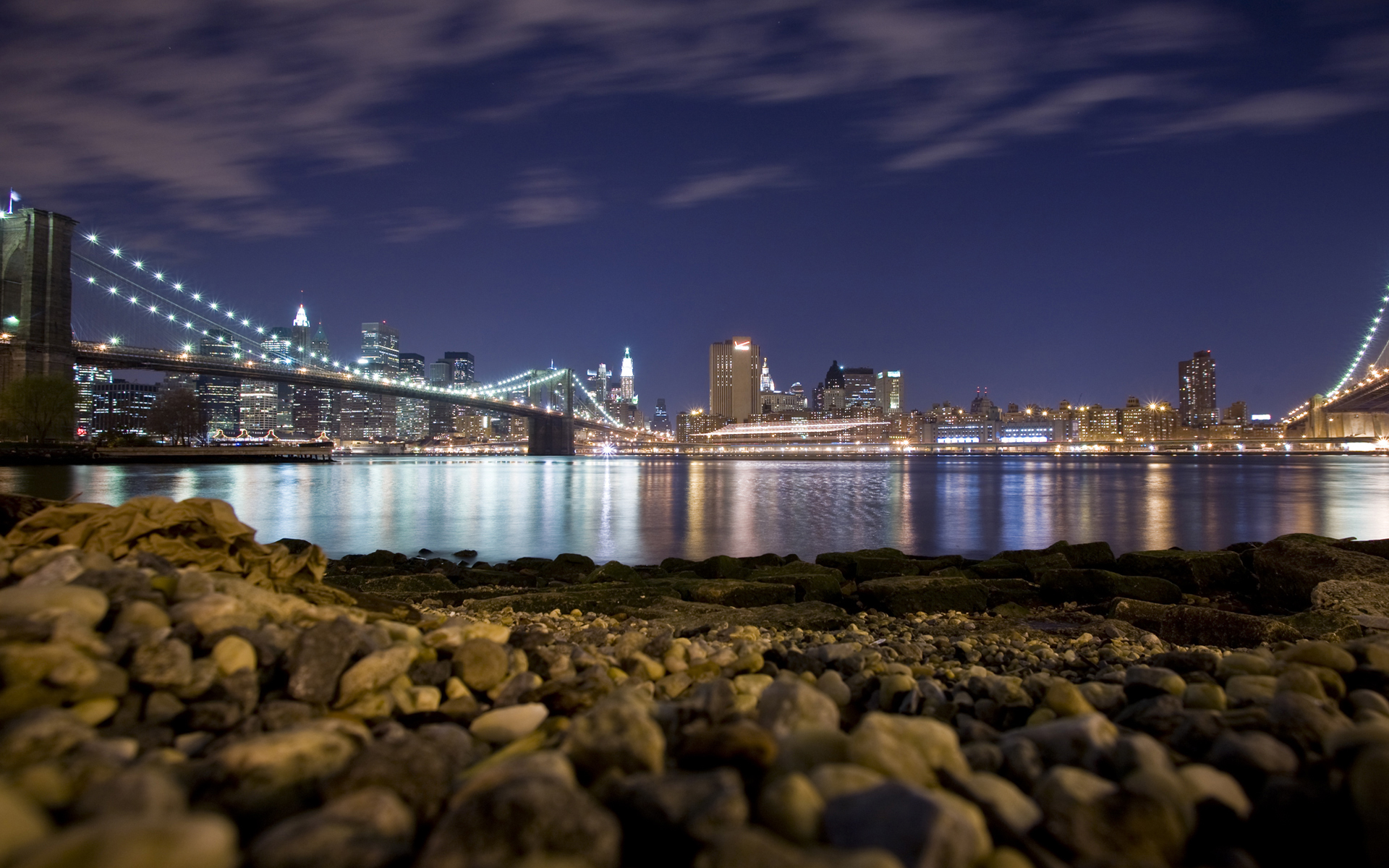 Manhattan skyline with the Brooklyn Bridge.
