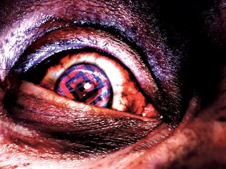 HD desktop wallpaper and background featuring a close-up of a bloodshot eye from the video game Manhunt, showcasing a dark, intense atmosphere.