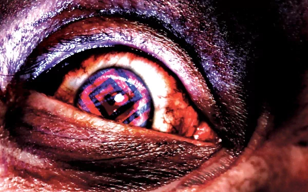 HD desktop wallpaper and background featuring a close-up of a bloodshot eye from the video game Manhunt, showcasing a dark, intense atmosphere.