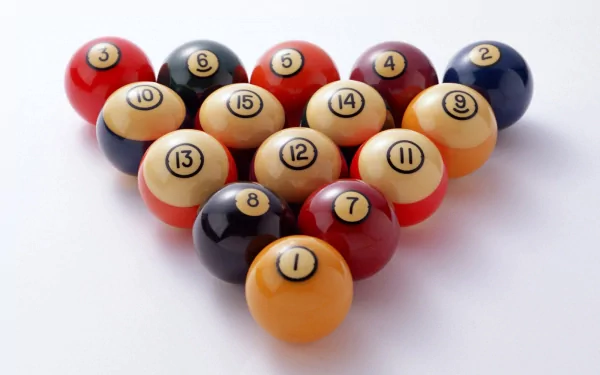 A high-definition desktop wallpaper featuring a close-up of colorful pool balls arranged in a triangle, showcasing the vibrant design typical of the game of pool.