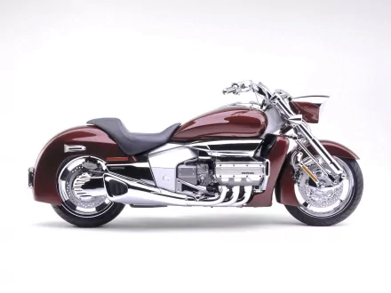 A stunning HD desktop wallpaper featuring a sleek Honda Rune motorcycle, showcasing its distinctive design and polished chrome details against a clean background.