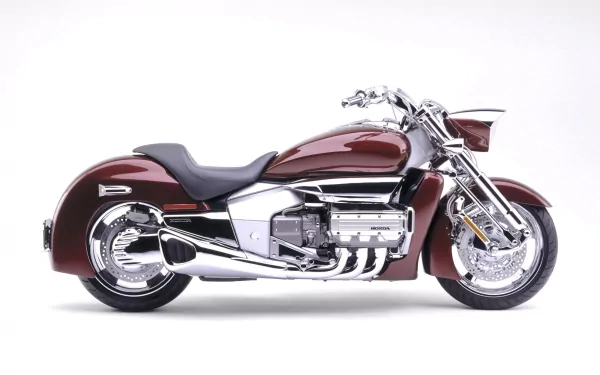 A stunning HD desktop wallpaper featuring a sleek Honda Rune motorcycle, showcasing its distinctive design and polished chrome details against a clean background.