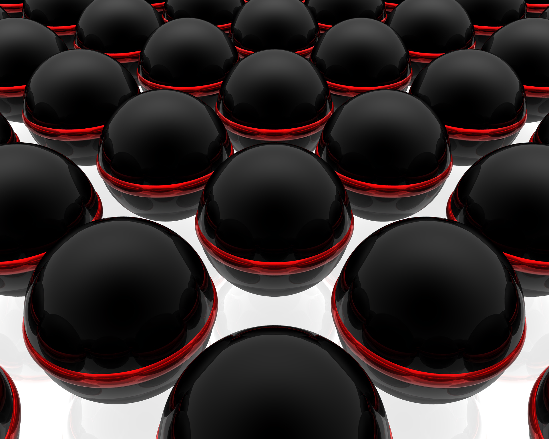 HD PC desktop wallpaper featuring a pattern of glossy black spheres with glowing red edges, creating a sleek and abstract visual effect.