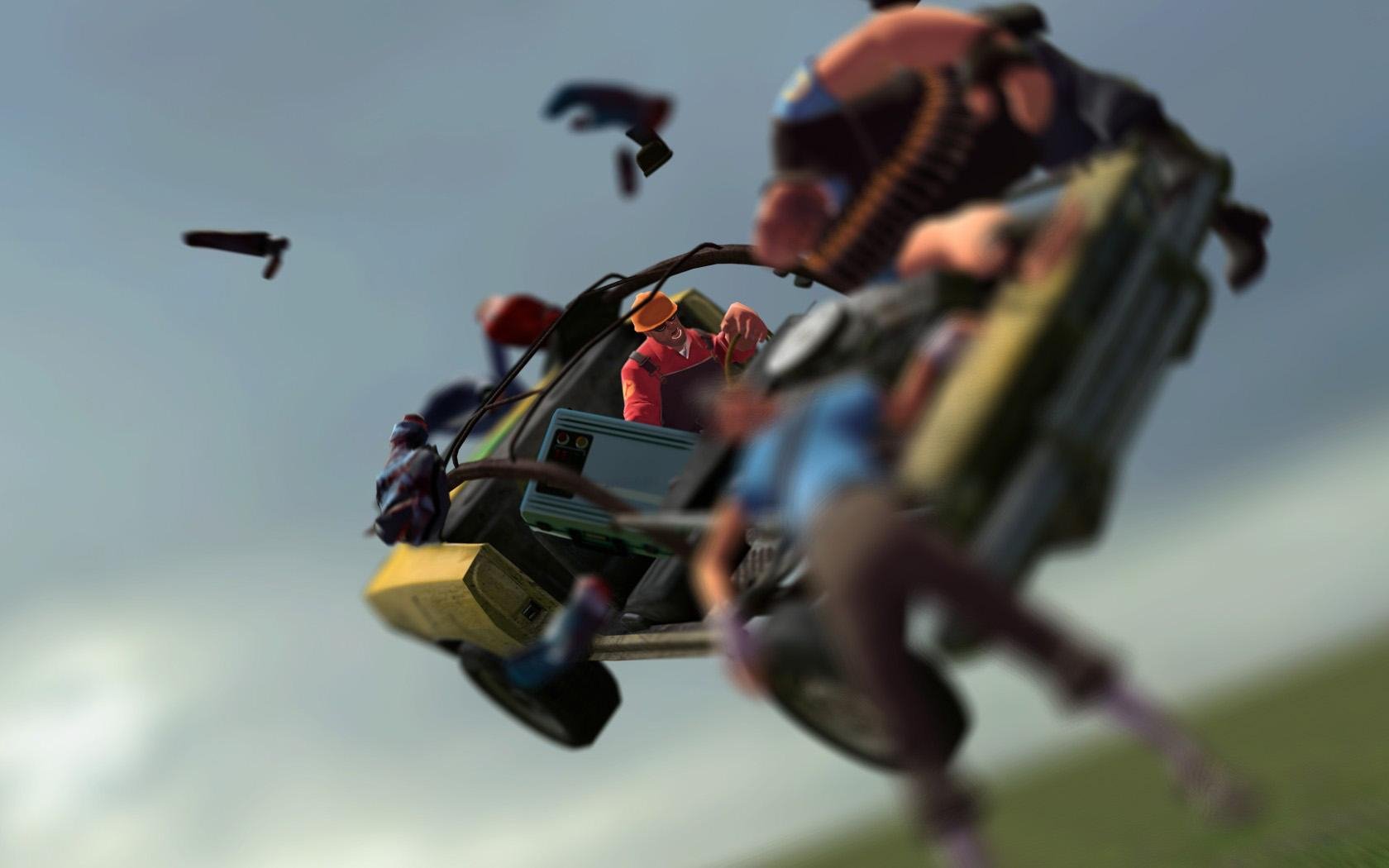 A dynamic Team Fortress 2 scene featuring characters in an action-packed moment, set against a dramatic background, designed as an HD PC desktop wallpaper.
