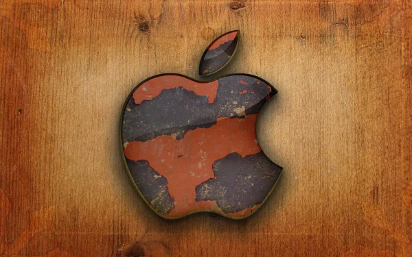 HD desktop wallpaper featuring the Apple Inc. logo with a rustic, weathered texture on a wooden background. The image exudes a vintage, technological aesthetic.
