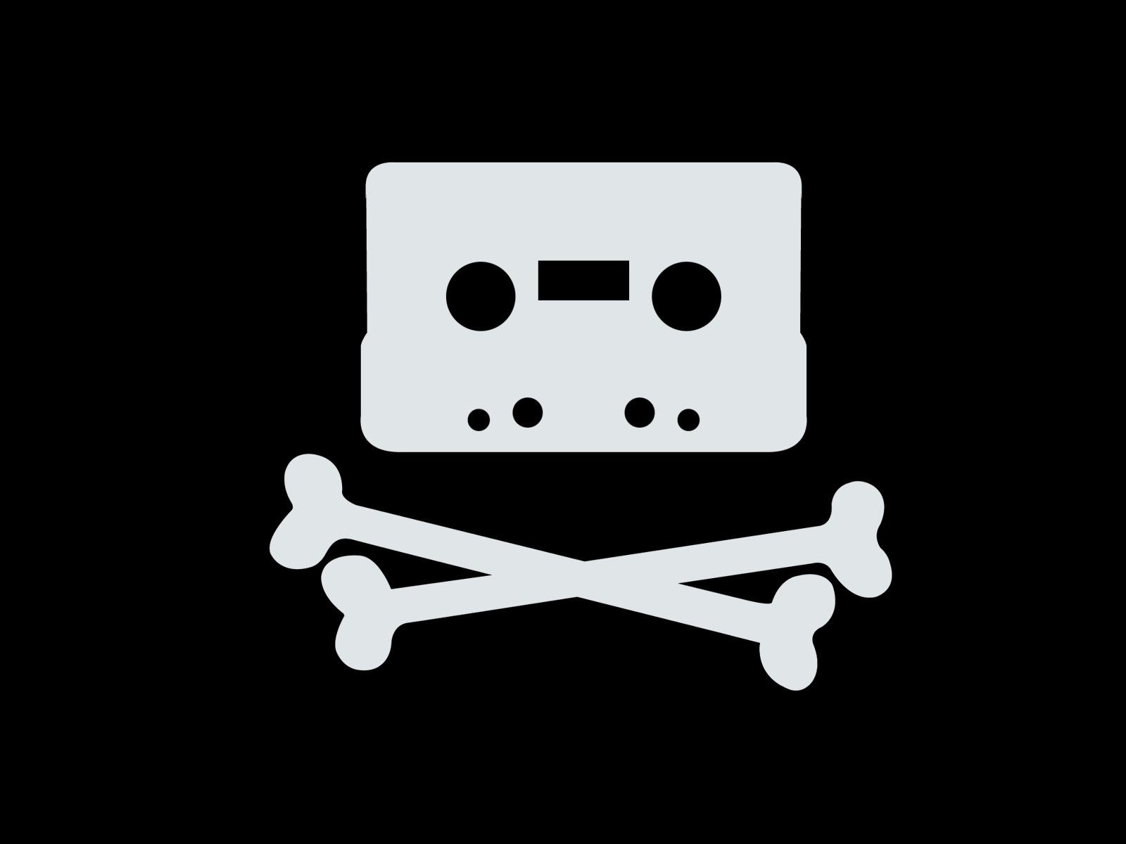 HD PC desktop wallpaper featuring a minimalist hacker-themed design with a cassette tape icon above crossed bones on a black background.