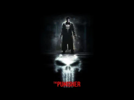 HD PC desktop wallpaper of The Punisher (2004) movie featuring the character standing above a glowing skull emblem in a dark, smoky background.