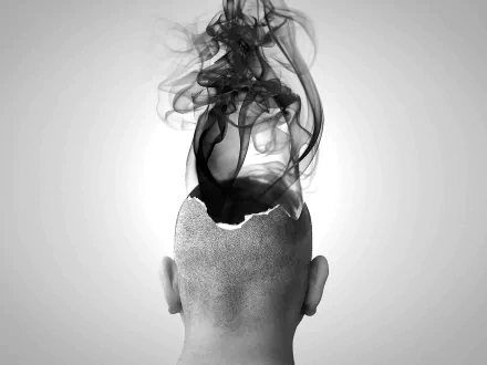 Artistic HD PC desktop wallpaper featuring the back of a human head with black smoke rising from an open skull, creating a surreal and thought-provoking visual.